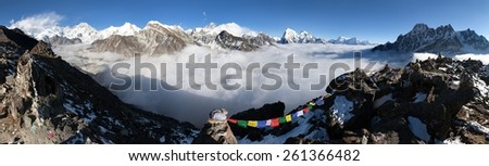 Panoramic view of Mount Everest, Lhotse, Cho Oyu Makalu from Gokyo Ri vith prayer flags - Khumbu valley, sagarmatha national park - Nepal