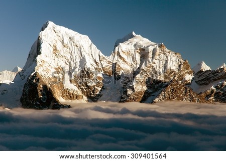 Evening view from Gokyo Ri to Arakam Tse, Cholatse and Tabuche Peak - trek to Everest base camp - Nepal