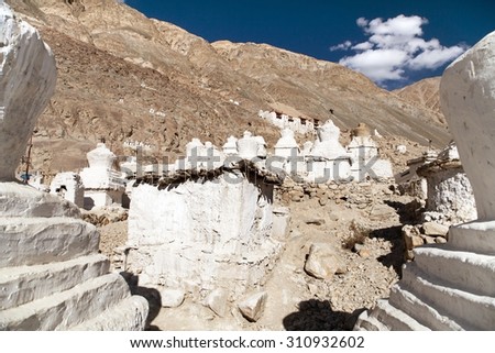 Ruins of royal palace with white buddhist stupas in Tiger or Tiggur village in Nubra valley, Ladakh, Jammu and Kashmir, India - Nubra valley was old kingdom in Karakoram mountains