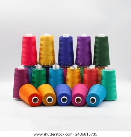 Similar – Image, Stock Photo Spools of thread on weaver loom