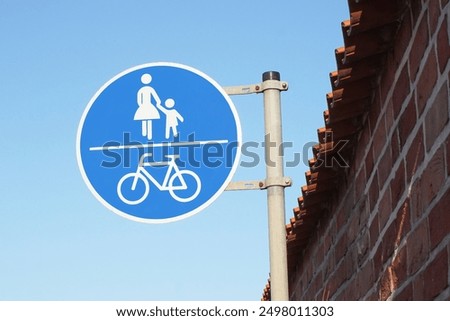 Similar – Image, Stock Photo pedestrian woman road sign on the green road in Bilbao city Spain