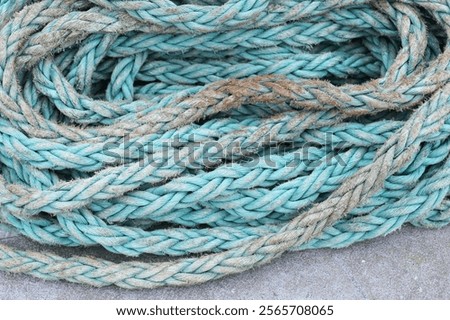 Image, Stock Photo Coil of used mooring ropes.