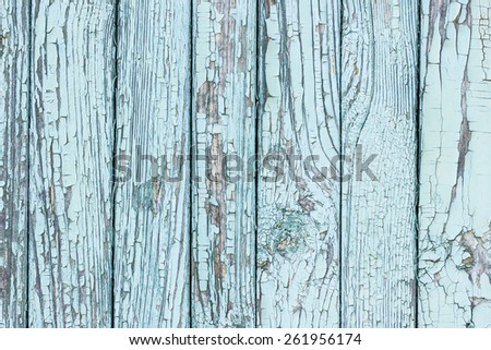 Wooden desks covered with peeling paint texture