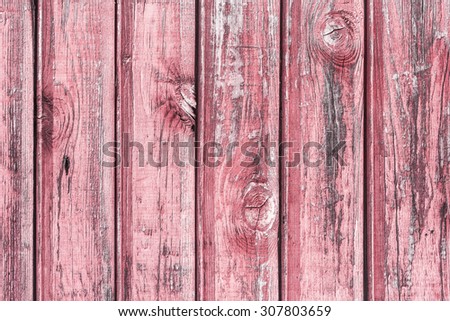 Red paint wooden desks texture.