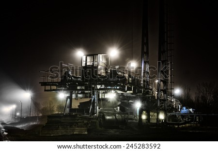 Coal mining machinery night, lamp light