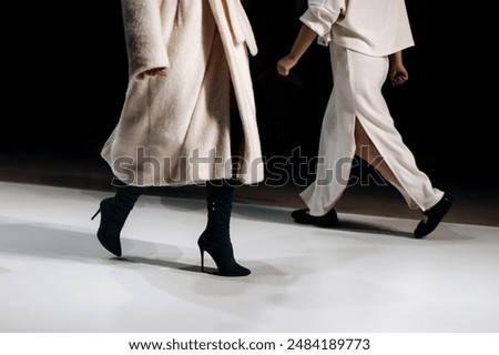 Similar – Image, Stock Photo Crop woman in dress and shoes in boutique