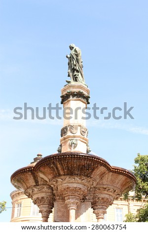 INNSBRUCK, AUSTRIA - MAY 17: The statue of Austrian crown prince Rudolf IV on the top of the Rudolf's Fountain on Boznerplatz on May 17, 2015 in Innsbruck. It was erected in 1877.