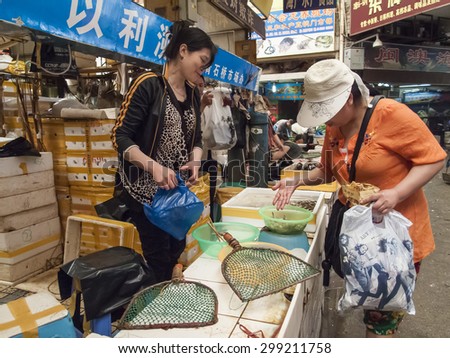 CHENGDU, CHINA - MAY 27, 2012: Food market in Chengdu, China. Chengdu is one of the most important food centers of China and at 2010 became UNESCO City of Gastronomy.