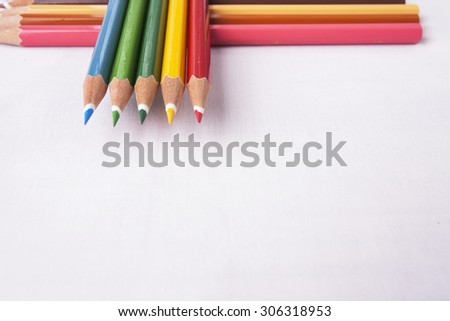 Colored pencils isolated on pure white background