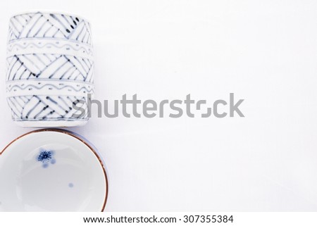 Traditional Japanese cup and bowl isolated on white background