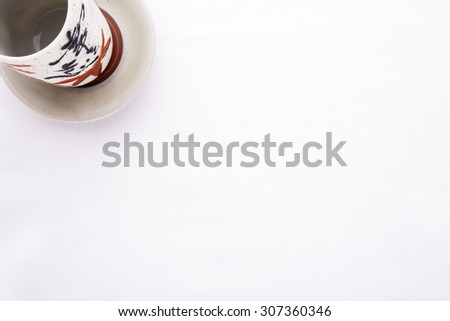 Traditional Japanese cup and saucer isolated on white background