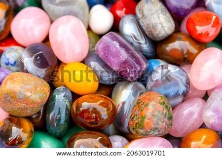 А pile of semi-precious, precious stones, close-up. The best natural material for interior design, jewelry craftsmanship. Background, texture.  Сток-фото © 