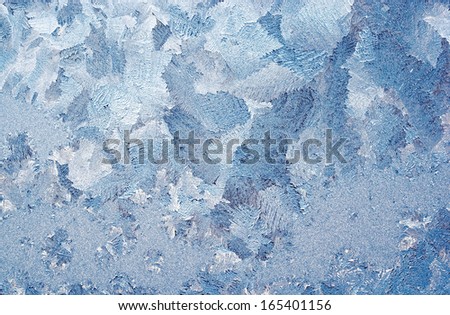 Frosty pattern, frozen winter design. Natural frosty background on winter window.
