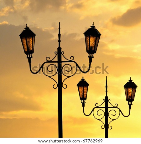 Street Lamp Of Retro Style. Street Light At Sunset With Cloudy Sky. Two ...