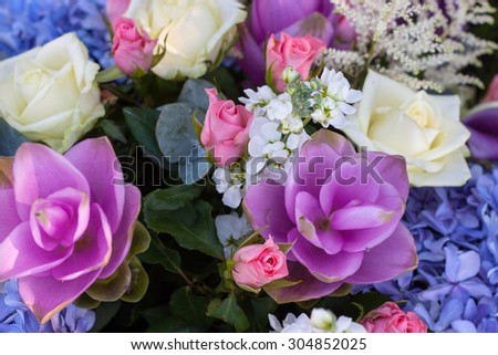 Flowers. Bouquet of white and pink roses, violets and ornamental cabbage.