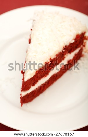 red velvet cake with coconut on red