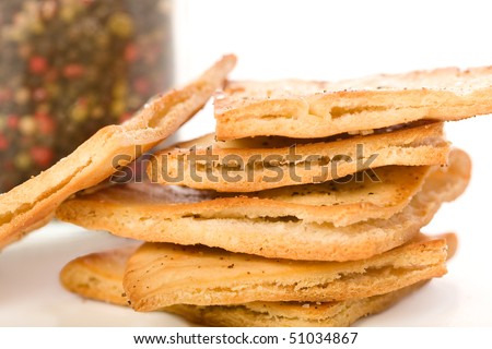 Garlic pita chips with large grain kosher salt and cracked pepper