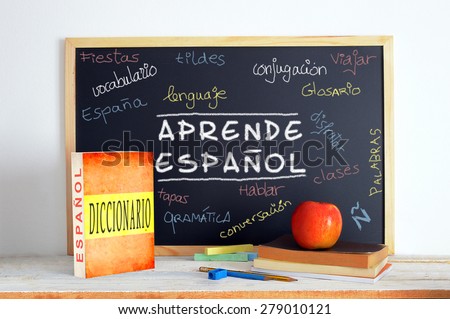 Blackboard with the message LEARN SPANISH and some text
 Stock fotó © 