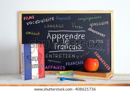 Blackboard with the message LEARN FRENCH and some text Stok fotoğraf © 