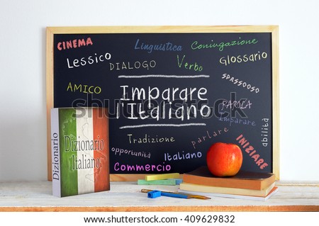 Blackboard in an Italian language classroom with the message Learn Italian and some other linguistic words. Stok fotoğraf © 