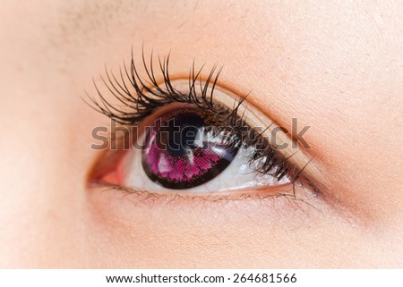 The Asian woman who did purple colored contact lenses and false eyelashes