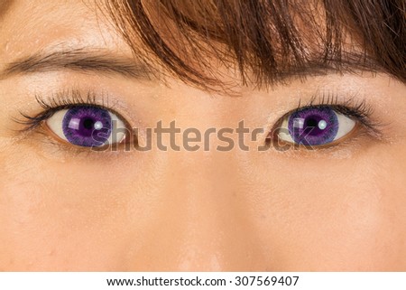 Purple colored contact lenses and both eyelashes extension eyes