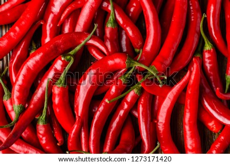 Red hot chilli peppers pattern texture background. Close up. A backdrop ofRed hot chilli peppers 商業照片 © 
