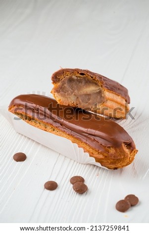eclair with chocolate, Eclairs with chocolate topping close up ストックフォト © 
