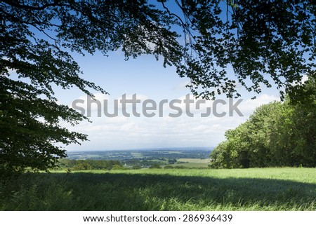 Countryside view in the South of England with trees framing the scene