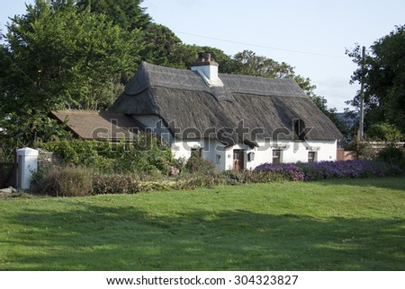 Pretty Thatched cottage in summer in County Wexford in the south east Ireland