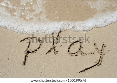 Play handwritten in sand for natural, symbol,tourism or conceptual designs with a clear wave