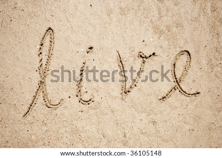 Live handwritten in sand for natural, symbol,tourism or conceptual designs