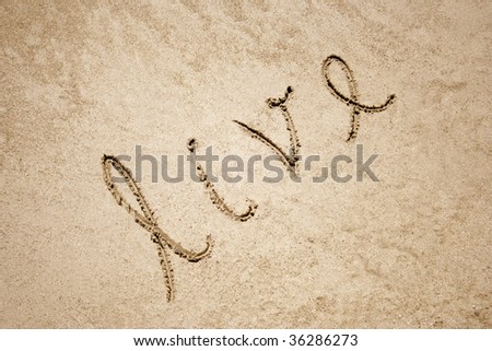 Live handwritten in sand for natural, symbol,tourism or conceptual designs