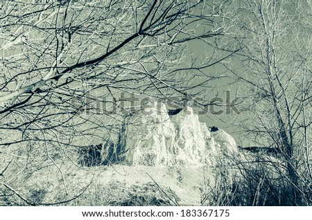 mountains rock view with sky. Trees around. Infrared photo