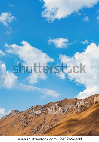 Similar – Image, Stock Photo Cloudy sky and mountain reflected in lake