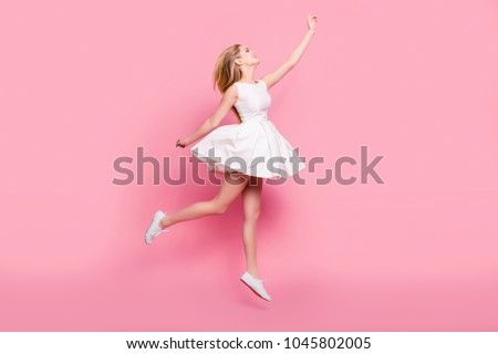 Similar – Image, Stock Photo Tender woman in white dress at seashore in summer