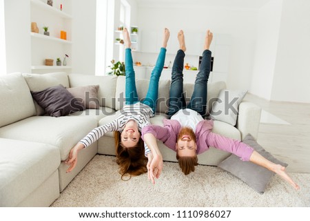 Similar – Image, Stock Photo Cheerful barefoot ginger woman waking up on bed