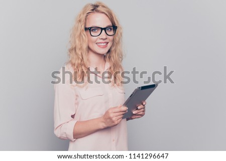 Free Photos A Young Girl With Blonde Hair Wearing Glasses And