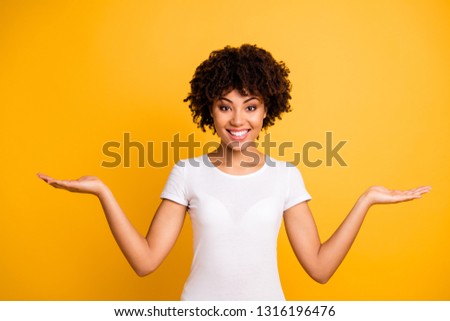 Portrait of her she nice cute lovely attractive cheerful cheery optimistic wavy-haired girl holding two palms copy space isolated on bright vivid shine yellow background Сток-фото © 