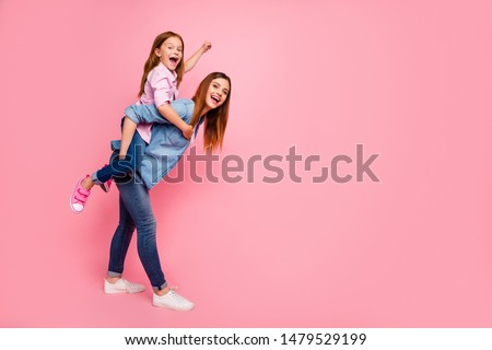 Similar – Image, Stock Photo Two schoolgirls spending time in school library. Primary school students learning from books. Children having fun in school club. Doing homework