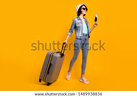 Similar – Image, Stock Photo Young and trendy woman in a sunny day sitting on the beach