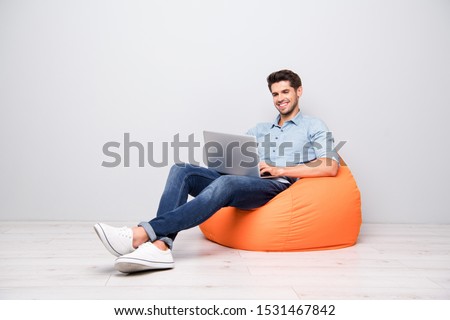 Similar – Image, Stock Photo Stylish young man sitting on concrete wall