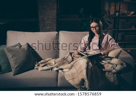 Similar – Image, Stock Photo Interested woman reading book at window sill at home