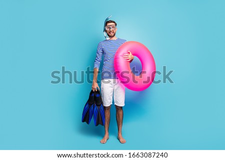 Similar – Image, Stock Photo Young man with snorkel and diving mask swimming and taking a selfie under water. Travel, vacation and sports activity concept.