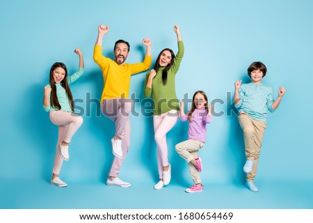Full length body size view of nice attractive lovely adorable ecstatic overjoyed cheerful cheery big full family celebrating luck isolated on bright vivid shine vibrant blue color background