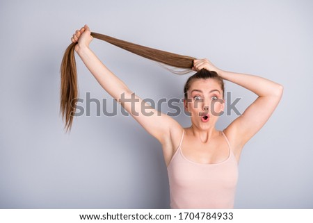 Similar – Image, Stock Photo Amazed girl making hairdo on dreadlocks of father