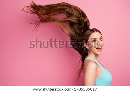 Portrait of her she nice attractive lovely cheerful cheery straight-haired girl ideal perfect clean smooth hair flying anti dander dandruff medicine isolated on pink pastel color background