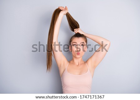 Similar – Image, Stock Photo Amazed girl making hairdo on dreadlocks of father