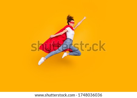 Full length body size view of her she nice attractive strong motivated energetic fit slim cheerful girl jumping wearing cape rescuing earth isolated bright vivid shine vibrant yellow color background Foto d'archivio © 