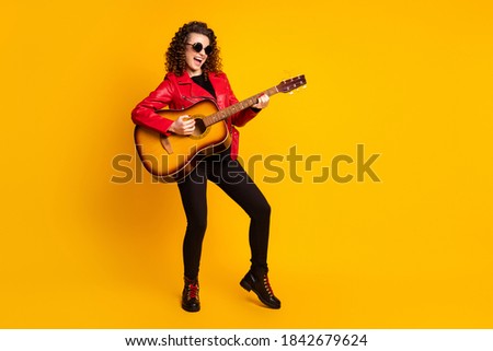 Similar – Image, Stock Photo Positive woman playing guitar in bedroom